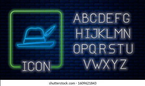 Glowing neon Oktoberfest hat icon isolated on brick wall background. Hunter hat with feather. German hat. Neon light alphabet. Vector Illustration