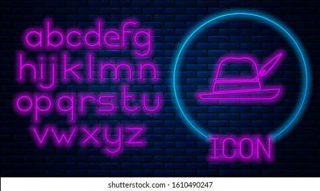 Glowing neon Oktoberfest hat icon isolated on brick wall background. Hunter hat with feather. German hat. Neon light alphabet. Vector Illustration