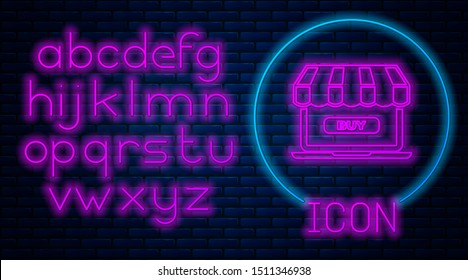 Glowing neon Online shopping concept. Buy on screen laptop icon isolated on brick wall background. Concept e-commerce, online business marketing. Neon light alphabet. Vector Illustration