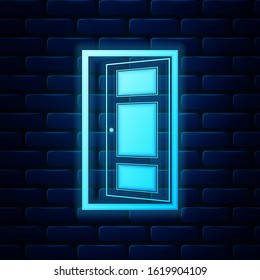 Glowing neon Open door icon isolated on brick wall background.  Vector Illustration