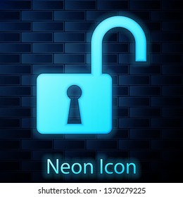 Glowing neon Open padlock icon isolated on brick wall background. Opened lock sign. Cyber security concept. Digital data protection. Safety safety. Vector Illustration