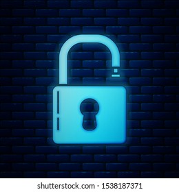 Glowing neon Open padlock icon isolated on brick wall background. Opened lock sign. Cyber security concept. Digital data protection. Safety safety.  Vector Illustration