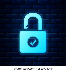 Glowing neon Open padlock icon isolated on brick wall background. Opened lock sign. Cyber security concept. Digital data protection. Safety safety.  Vector Illustration