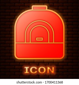 Glowing neon Oven icon isolated on brick wall background. Stove gas oven sign. Vector Illustration