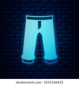 Glowing neon Pants icon isolated on brick wall background. Trousers sign.  Vector