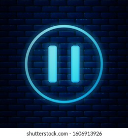 Glowing neon Pause button icon isolated on brick wall background.  Vector Illustration