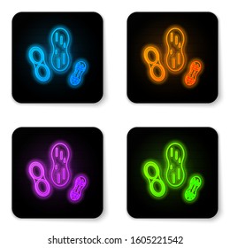 Glowing neon Peanut icon isolated on white background. Black square button. Vector Illustration