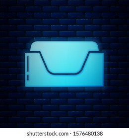 Glowing neon Pet bed icon isolated on brick wall background.  Vector Illustration
