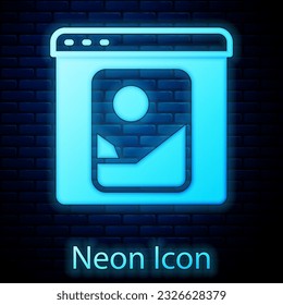 Glowing neon Photo retouching icon isolated on brick wall background. Photographer, photography, retouch icon.  Vector