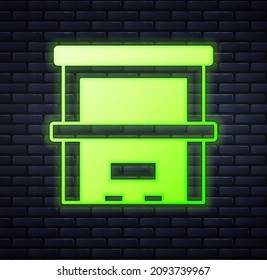 Glowing neon Piano icon isolated on brick wall background. Musical instrument.  Vector