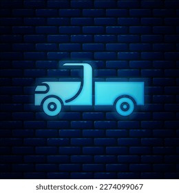 Glowing neon Pickup truck icon isolated on brick wall background.  Vector Illustration