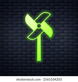 Glowing neon Pinwheel toy icon isolated on brick wall background. Windmill toy icon.  Vector