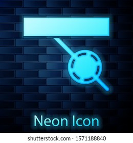Glowing neon Pirate eye patch icon isolated on brick wall background. Pirate accessory.  Vector Illustration