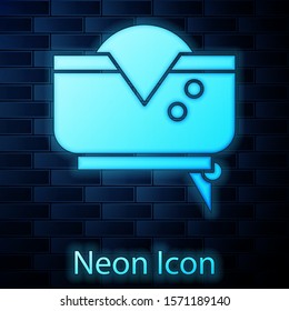 Glowing neon Pirate hat icon isolated on brick wall background.  Vector Illustration