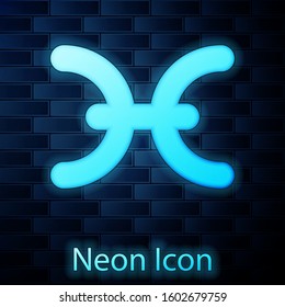 Glowing neon Pisces zodiac sign icon isolated on brick wall background. Astrological horoscope collection.  Vector Illustration