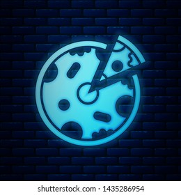 Glowing neon Pizza icon isolated on brick wall background. Fast food menu.  Vector Illustration