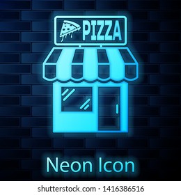 Glowing neon Pizzeria building facade icon isolated on brick wall background. Fast food pizzeria kiosk. Vector Illustration