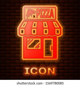 Glowing neon Pizzeria building facade icon isolated on brick wall background. Fast food pizzeria kiosk.  Vector Illustration