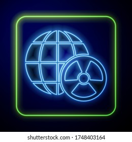 Glowing neon Planet earth and radiation symbol icon isolated on blue background. Environmental concept.  Vector