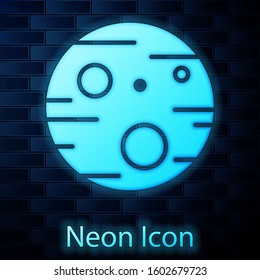 Glowing neon Planet Mars icon isolated on brick wall background.  Vector Illustration