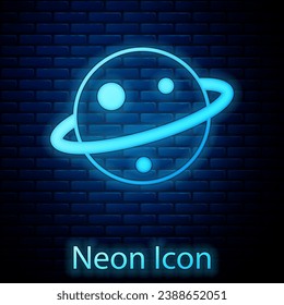 Glowing neon Planet Saturn with planetary ring system icon isolated on brick wall background.  Vector