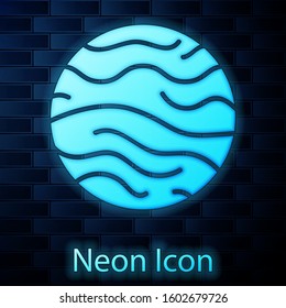 Glowing neon Planet Venus icon isolated on brick wall background.  Vector Illustration