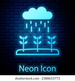 Glowing neon Plant sprouts grow in the rain icon isolated on brick wall background. Seedling concept.  Vector