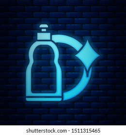 Glowing neon Plastic bottle for liquid laundry detergent, bleach, dishwashing liquid or another cleaning agent icon isolated on brick wall background.  Vector Illustration