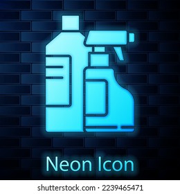 Glowing neon Plastic bottles for laundry detergent, bleach, dishwashing liquid or another cleaning agent icon isolated on brick wall background.  Vector Illustration