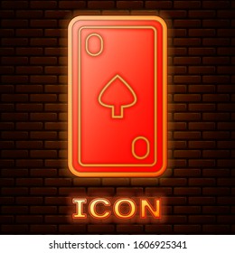 Glowing neon Playing card with diamonds symbol icon isolated on brick wall background. Casino gambling.  Vector Illustration