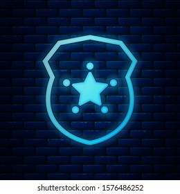 Glowing neon Police badge icon isolated on brick wall background. Sheriff badge sign.  Vector Illustration