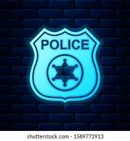 Glowing neon Police badge icon isolated on brick wall background. Sheriff badge sign.  Vector Illustration