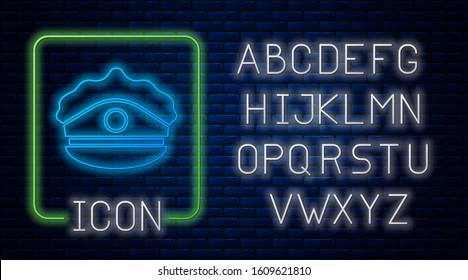 Glowing neon Police cap with cockade icon isolated on brick wall background. Police hat sign. Neon light alphabet. Vector Illustration