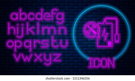 Glowing neon Power bank with screwdriver and wrench icon isolated on brick wall background. Adjusting, service, setting, maintenance, repair, fixing. Neon light alphabet. Vector Illustration