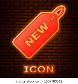 Glowing neon Price tag with an inscription New icon isolated on brick wall background. Badge for price. Promo tag discount.  Vector Illustration
