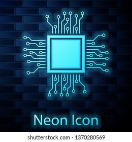 Glowing neon Processor icon isolated on brick wall background. CPU, central processing unit, microchip, microcircuit, computer processor, chip. Vector Illustration