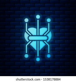Glowing neon Processor icon isolated on brick wall background. CPU, central processing unit, microchip, microcircuit, computer processor, chip.  Vector Illustration