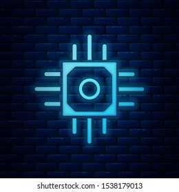 Glowing neon Processor icon isolated on brick wall background. CPU, central processing unit, microchip, microcircuit, computer processor, chip.  Vector Illustration