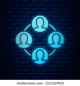 Glowing neon Project team base icon isolated on brick wall background. Business analysis and planning, consulting, team work, project management.  Vector Illustration