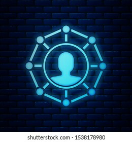 Glowing neon Project team base icon isolated on brick wall background. Business analysis and planning, team work, project management. Developers.  Vector Illustration