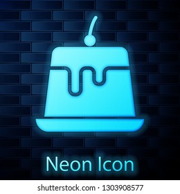 Glowing neon Pudding custard with caramel glaze icon isolated on brick wall background. Vector Illustration