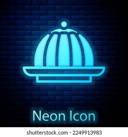 Glowing neon Pudding custard with caramel glaze icon isolated on brick wall background.  Vector