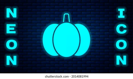 Glowing neon Pumpkin icon isolated on brick wall background. Happy Halloween party.  Vector