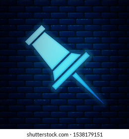 Glowing neon Push pin icon isolated on brick wall background. Thumbtacks sign.  Vector Illustration