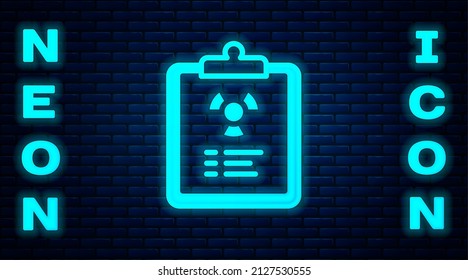 Glowing neon Radiation warning document icon isolated on brick wall background. Text file.  Vector