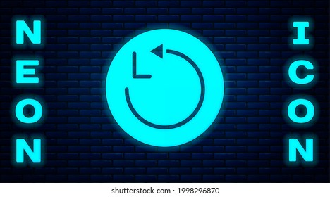 Glowing neon Radius icon isolated on brick wall background.  Vector
