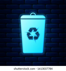 Glowing neon Recycle bin with recycle symbol icon isolated on brick wall background. Trash can icon. Garbage bin sign. Recycle basket sign.  Vector Illustration