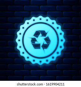 Glowing neon Recycle symbol label icon isolated on brick wall background. Environment recycling symbol.  Vector Illustration