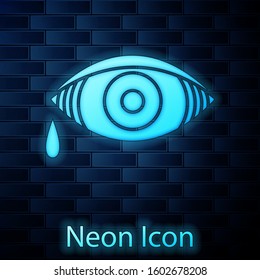 Glowing neon Reddish eye due to viral, bacterial or allergic conjunctivitis icon isolated on brick wall background.  Vector Illustration