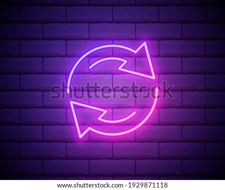 Glowing neon Refresh icon isolated on brick wall background. Reload symbol. Rotation arrows in a circle sign. Vector Illustration.